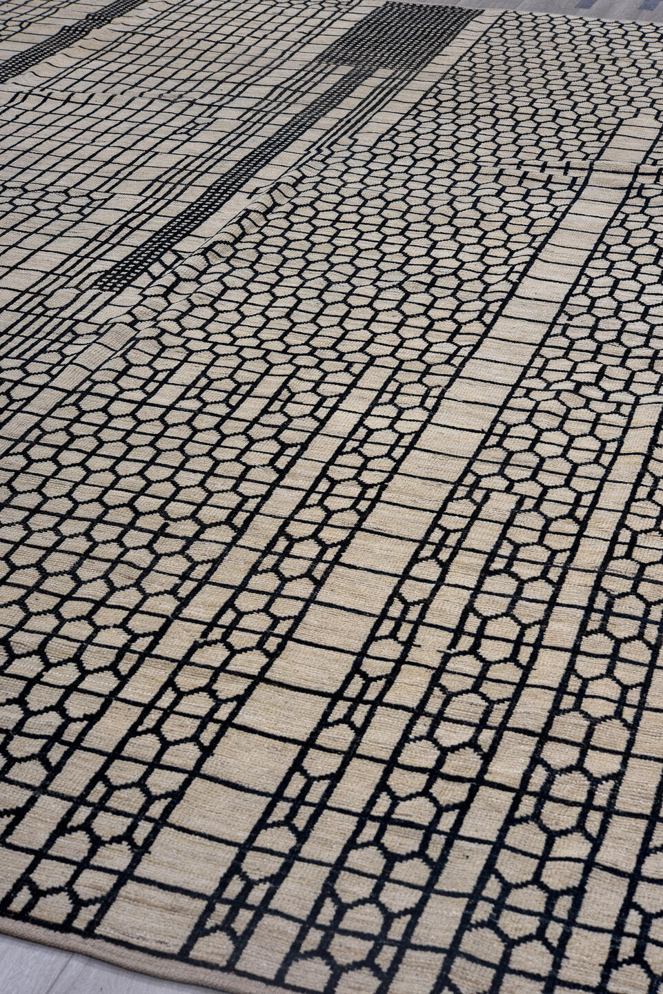 9' x 12' one-of-a-kind handmade vintage Tulu large size rug. Color palette: ivory, black