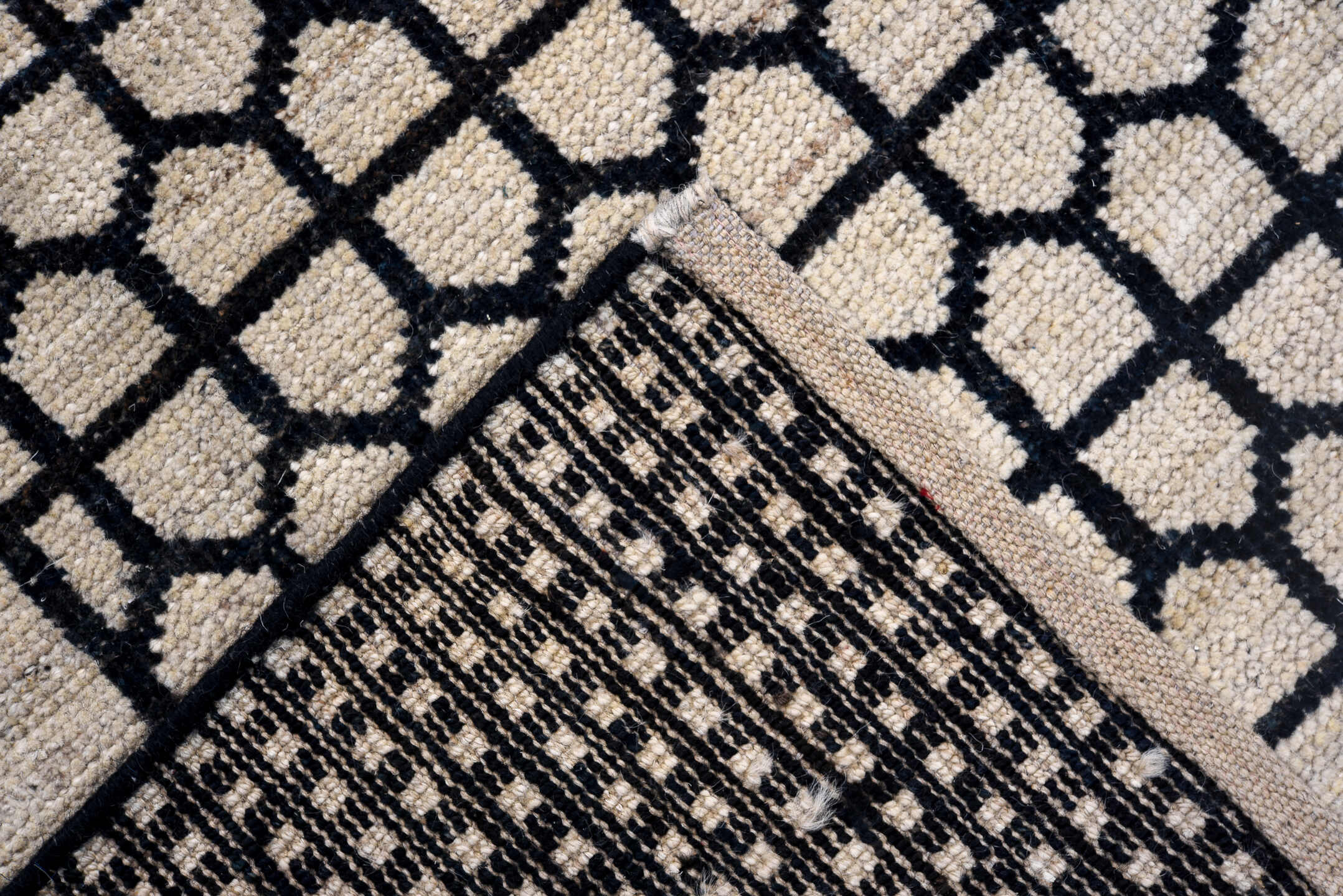 9' x 12' one-of-a-kind handmade vintage Tulu large size rug. Color palette: ivory, black