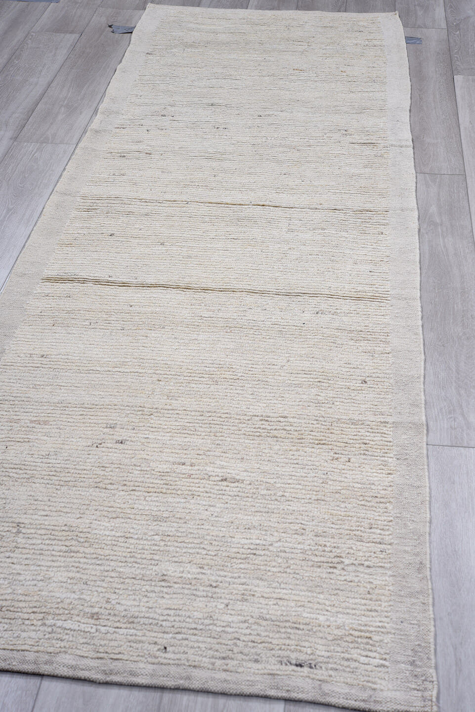 3' x 10' one-of-a-kind handmade vintage Tulu runner rug. Color palette: ivory, light gray, cream, taupe, charcoal, beige