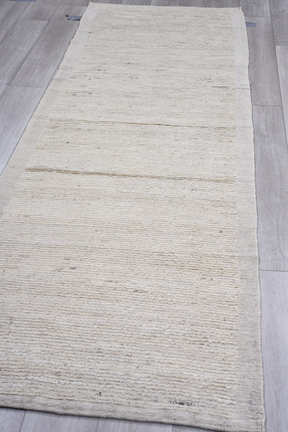 3' x 10' one-of-a-kind handmade vintage Tulu runner rug. Color palette: ivory, light gray, cream, taupe, charcoal, beige