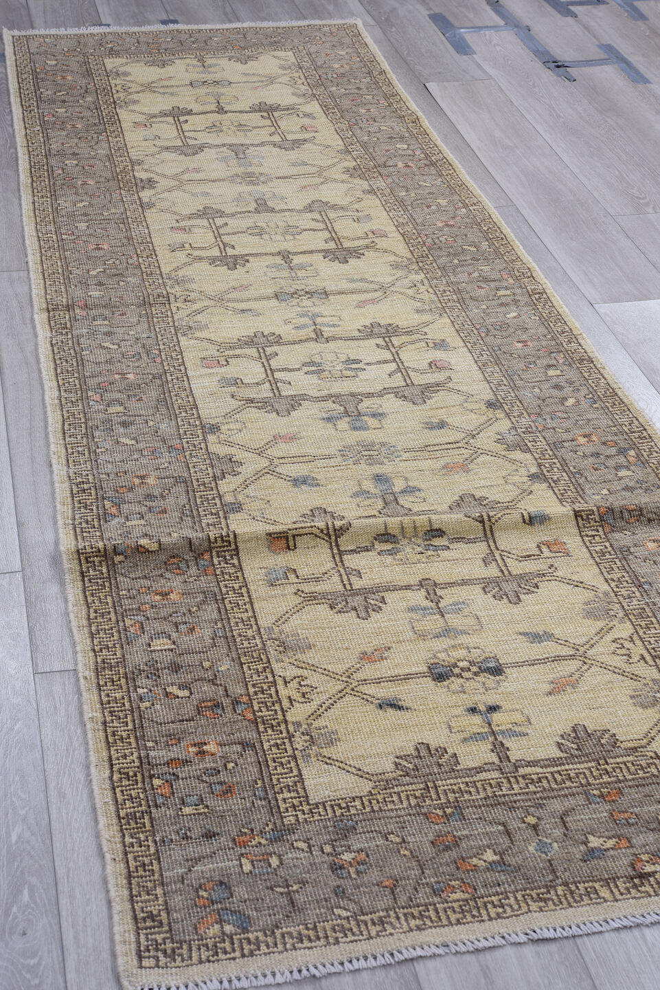 3' x 10' one-of-a-kind handmade vintage Oushak runner rug. Color palette: ivory, gray, taupe, slate, dusty blue, blush