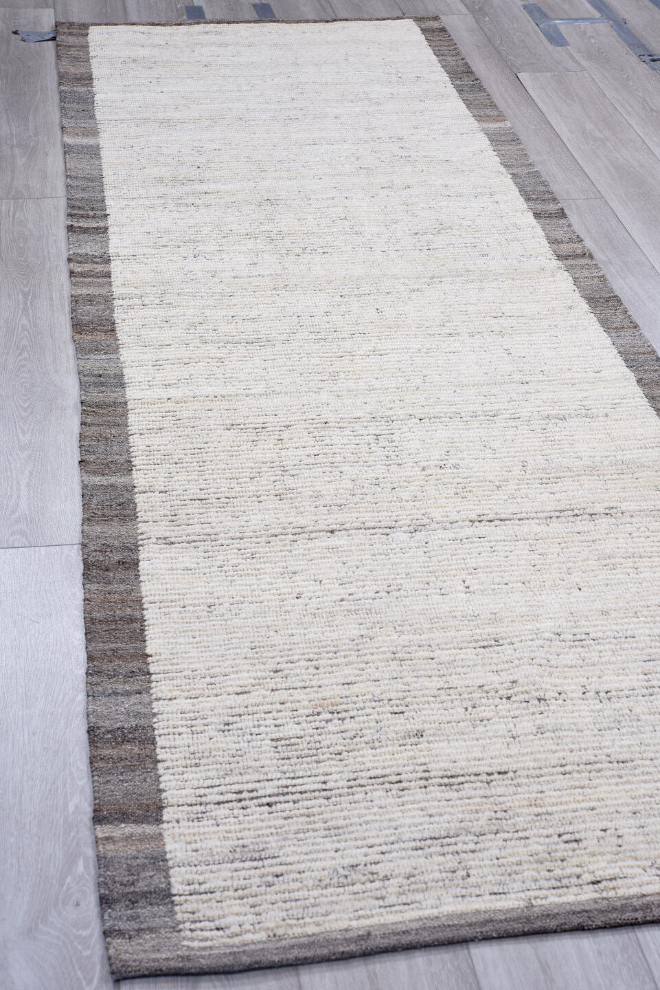 3' x 10' one-of-a-kind handmade vintage Tulu runner rug. Color palette: ivory, charcoal, gray, taupe, black, beige