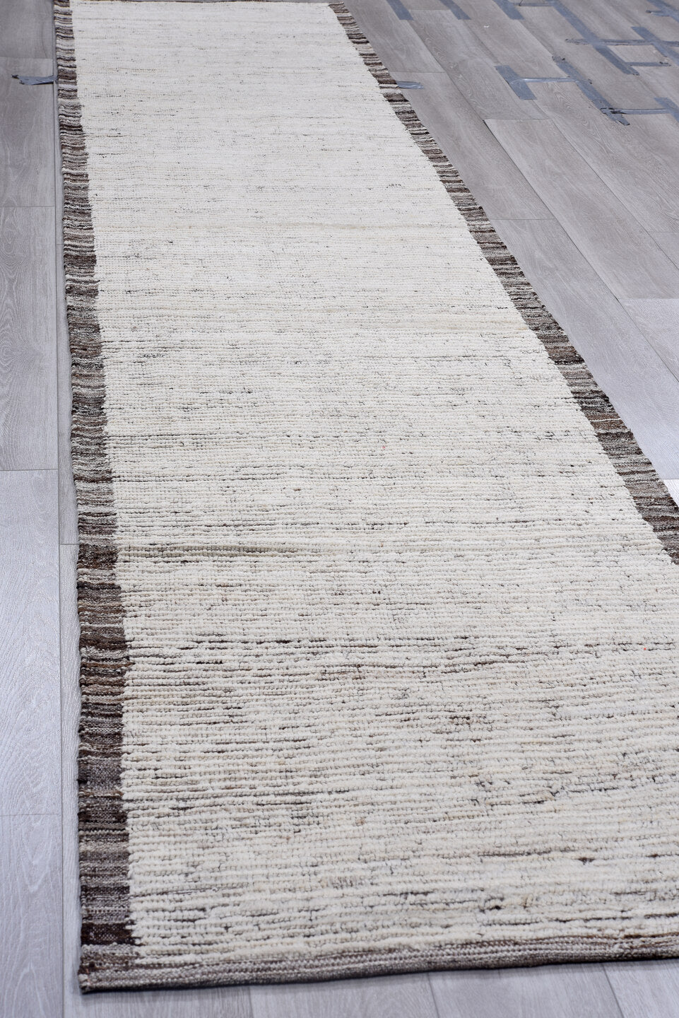 3' x 14' one-of-a-kind handmade vintage Tulu runner rug. Color palette: ivory, charcoal, taupe, gray, black, beige