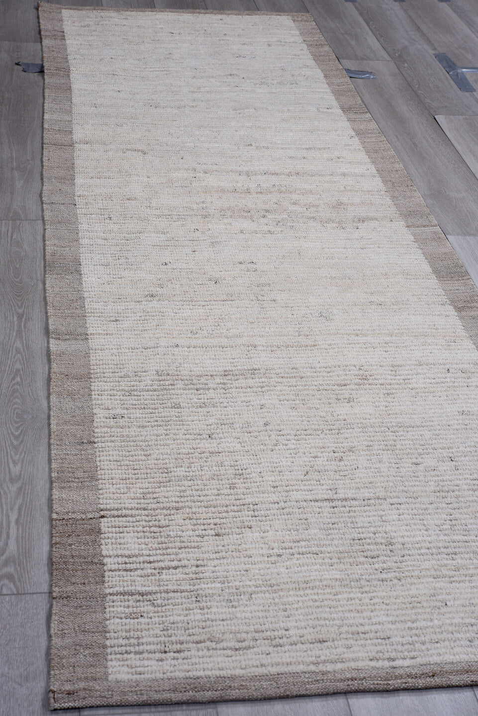 3' x 10' one-of-a-kind handmade vintage Tulu runner rug. Color palette: ivory, taupe, gray, cream, beige