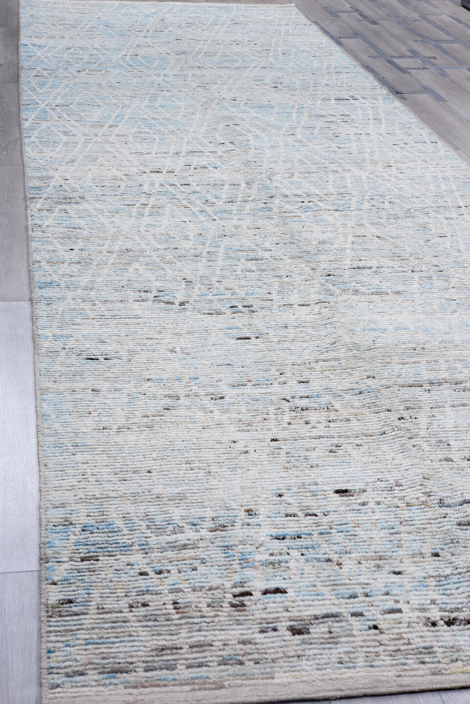 5' x 20' one-of-a-kind handmade vintage Tulu rug. Color palette: ivory, sky blue, gray, charcoal, light blue, black