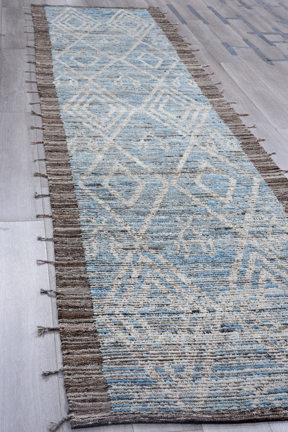 3' x 16' one-of-a-kind handmade vintage Tulu runner rug. Color palette: ivory, sky blue, charcoal, slate, taupe, light blue