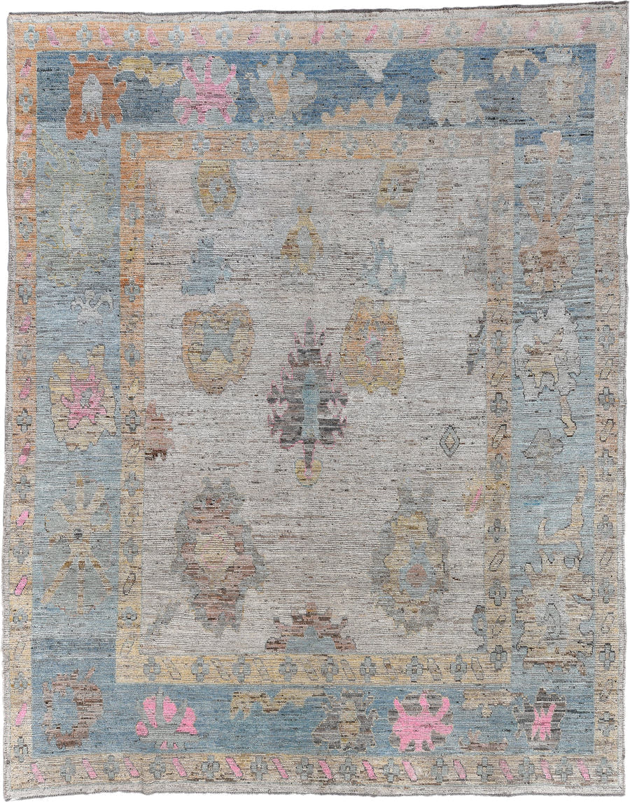 10' x 13' one-of-a-kind handmade vintage Oushak oversize rug. Color palette: ivory, pale blue, sand, pink, gold, taupe
