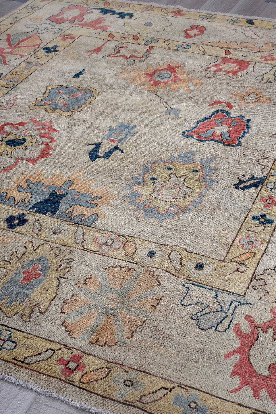 7' x 9' one-of-a-kind handmade vintage Oushak rug. Color palette: ivory, pale blue, coral, navy, beige, taupe, peach