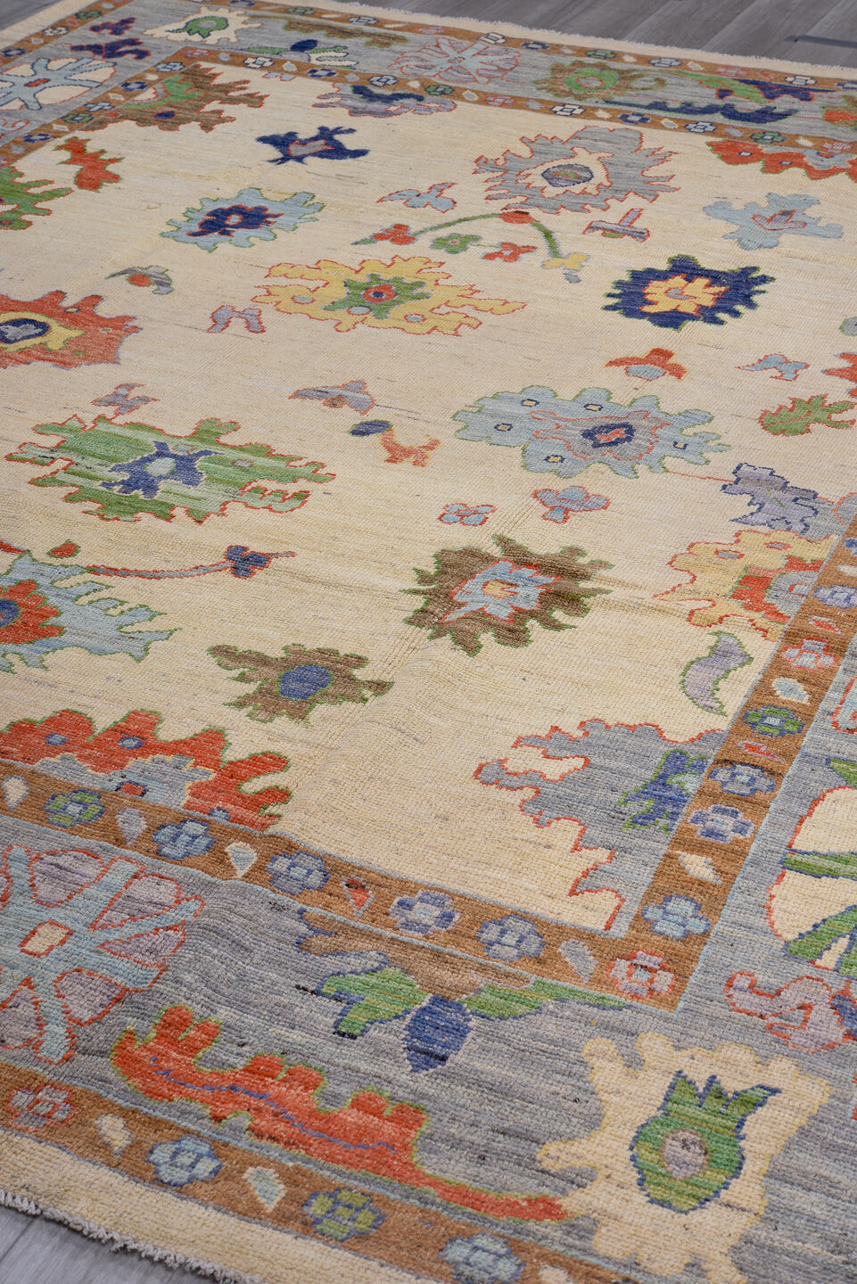 9' x 11' one-of-a-kind handmade vintage Oushak large size rug. Color palette: ivory, gray, terra cotta, sage, sky blue, navy