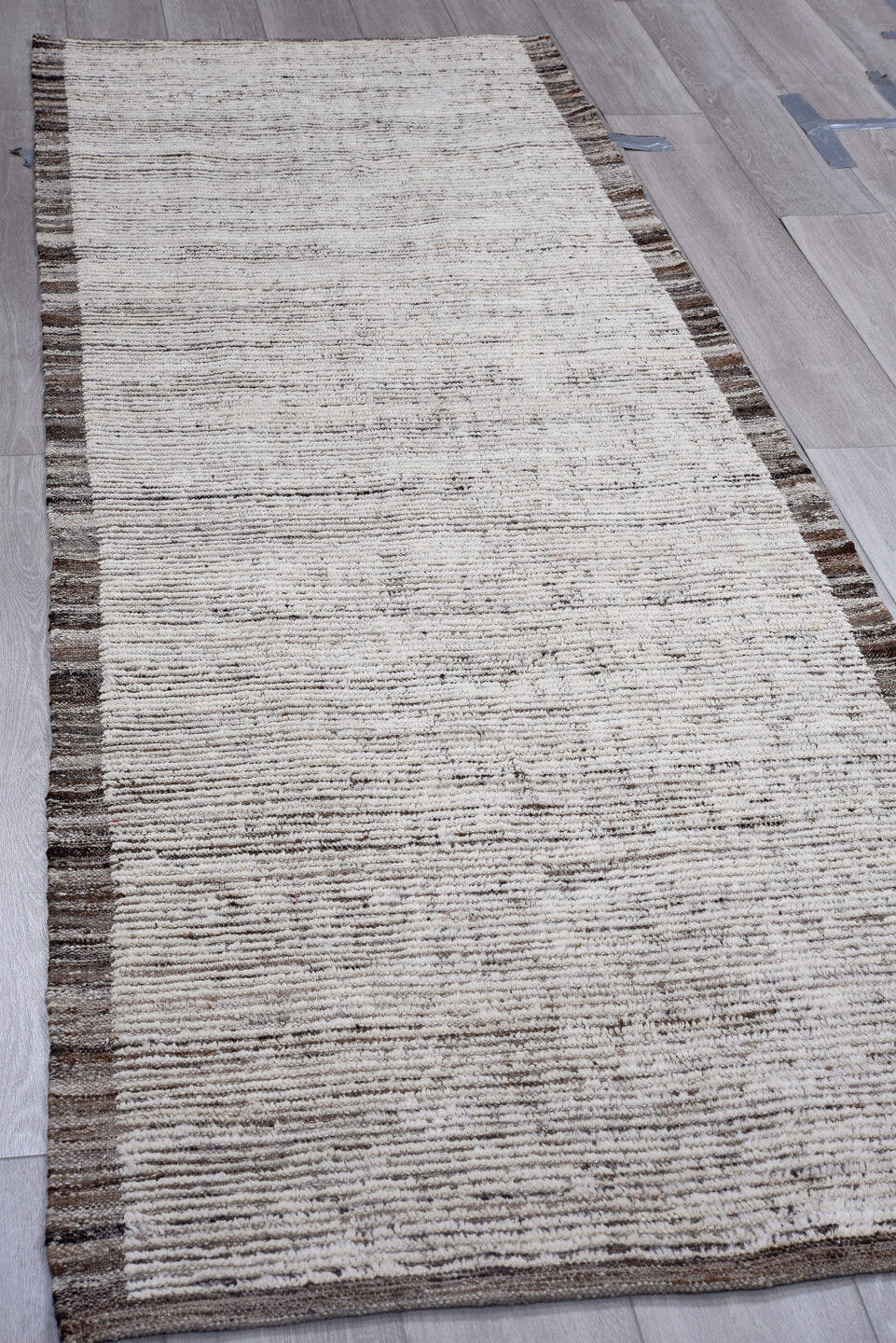 3' x 12' one-of-a-kind handmade vintage Tulu runner rug. Color palette: ivory, gray, charcoal, black