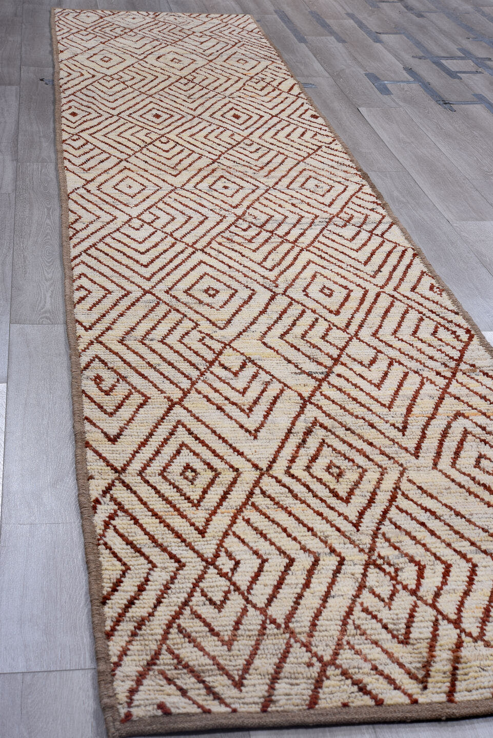 3' x 16' one-of-a-kind handmade vintage Tulu runner rug. Color palette: ivory, rust, brown, terracotta