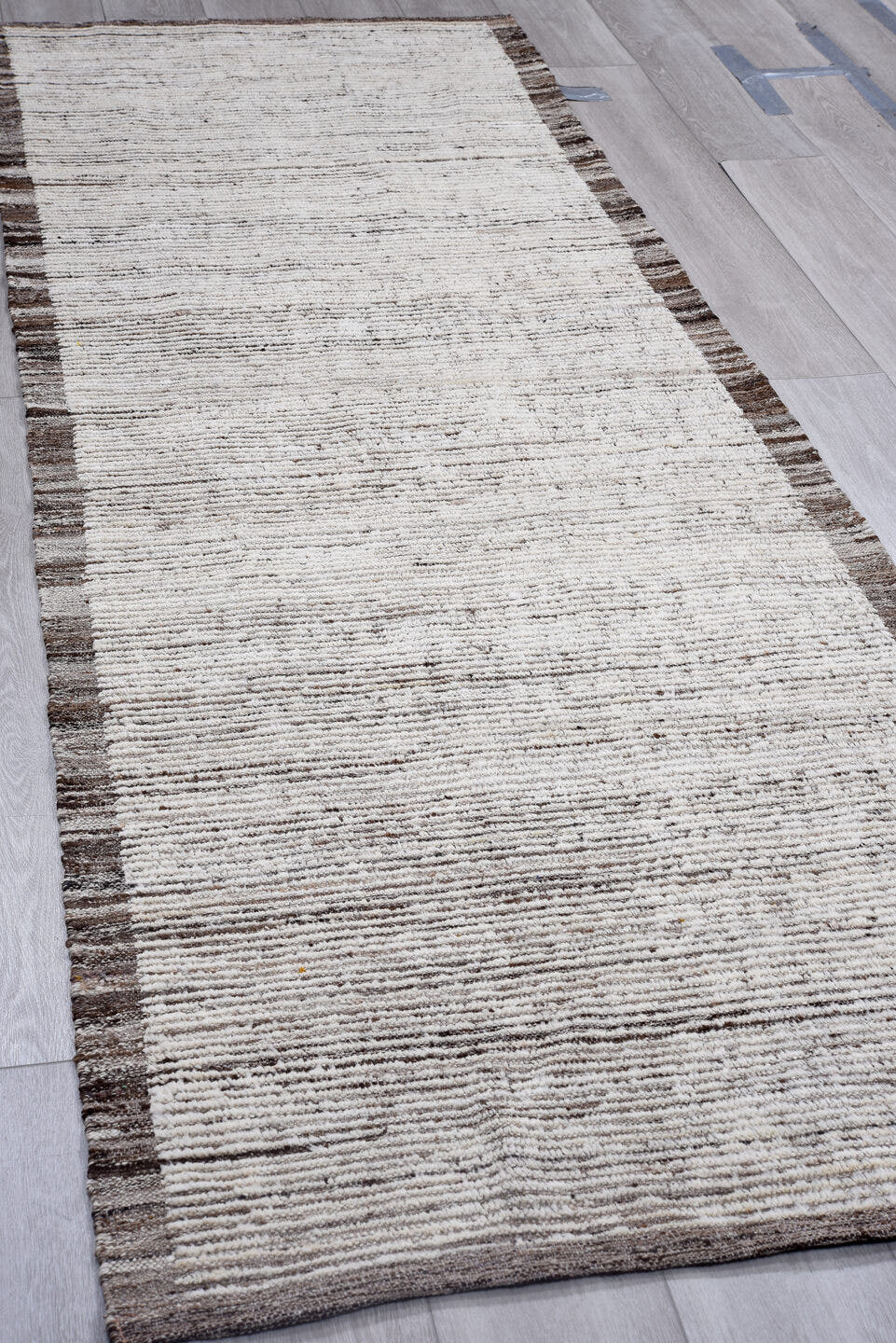 3' x 9' one-of-a-kind handmade vintage Tulu runner rug. Color palette: ivory, brown, taupe, charcoal, beige, gray, black
