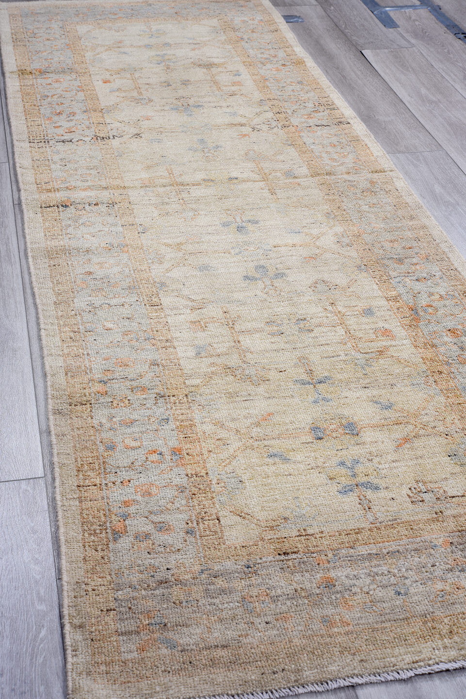 3' x 9' one-of-a-kind handmade vintage Oushak runner rug. Color palette: ivory, pale blue, beige, taupe, rust, camel