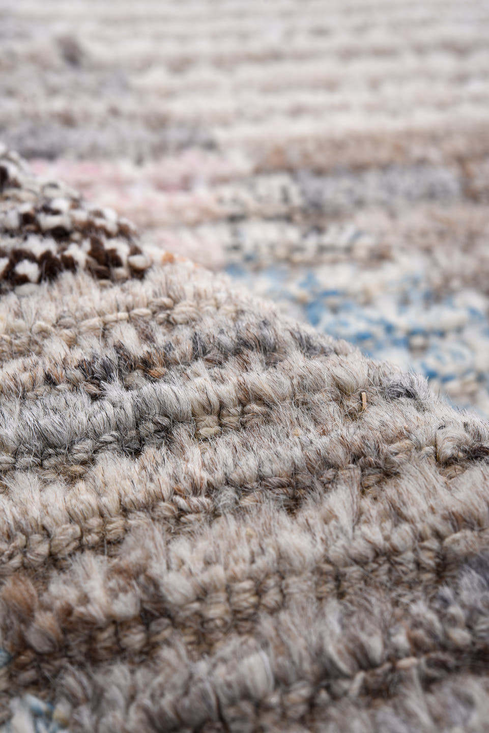 3' x 9' one-of-a-kind handmade vintage Tulu runner rug. Color palette: ivory, taupe, gray, charcoal, sky blue, blush, rust