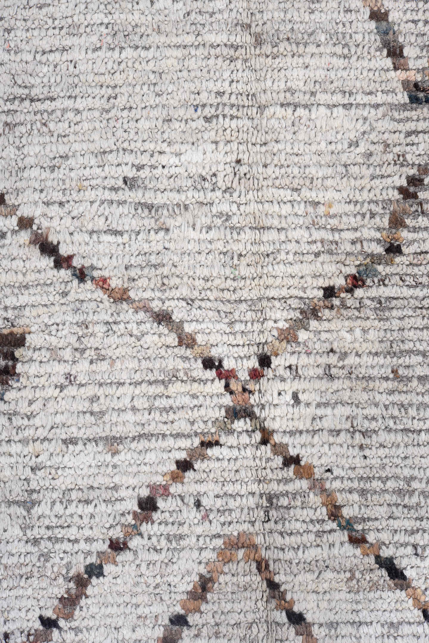 8' x 9' one-of-a-kind handmade vintage Tulu rug. Color palette: ivory, taupe, terra cotta, charcoal, slate, faded blue