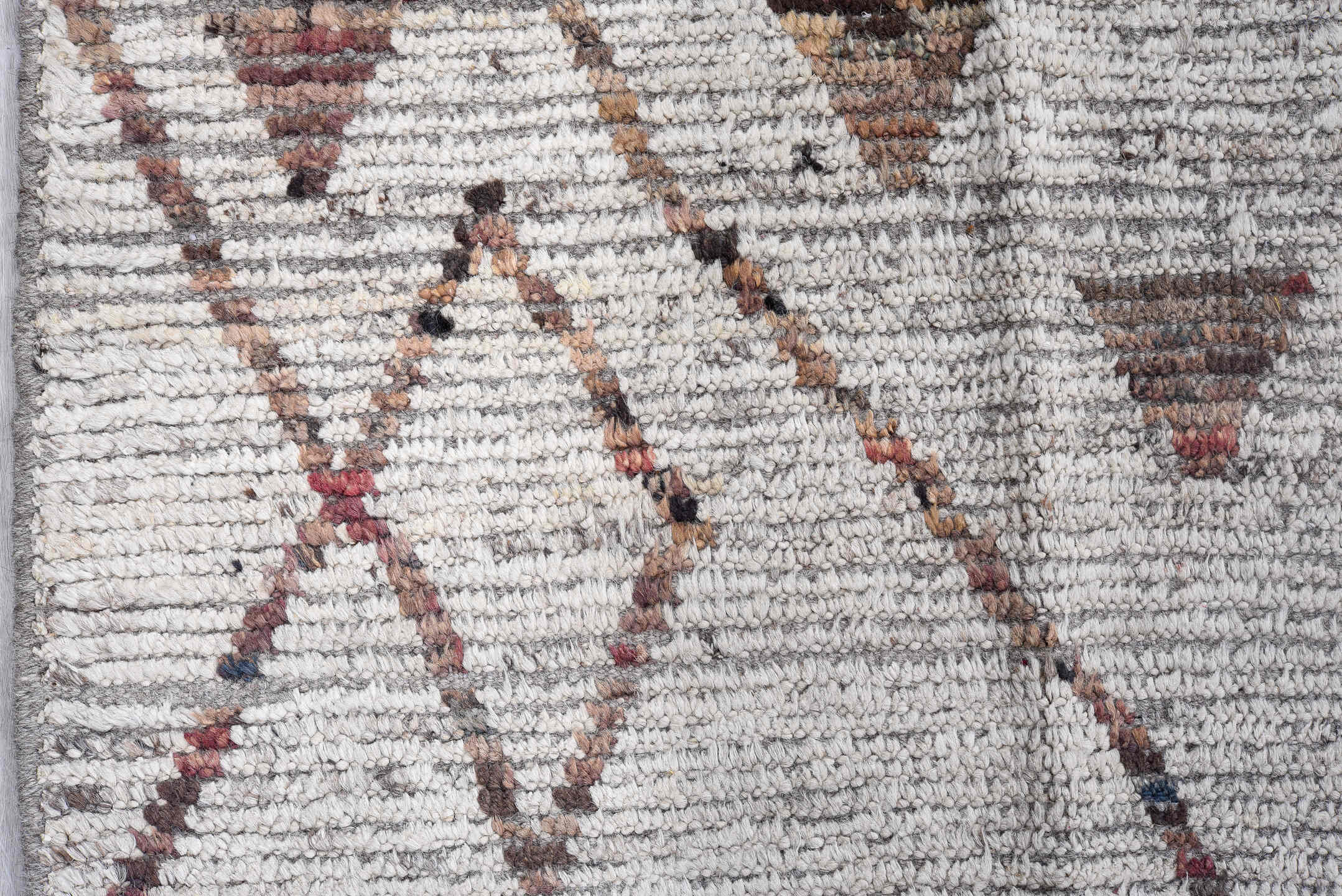 8' x 9' one-of-a-kind handmade vintage Tulu rug. Color palette: ivory, taupe, terra cotta, charcoal, slate, faded blue