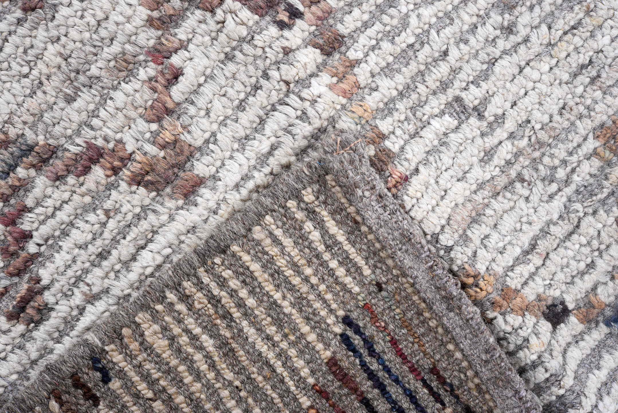 8' x 9' one-of-a-kind handmade vintage Tulu rug. Color palette: ivory, taupe, terra cotta, charcoal, slate, faded blue