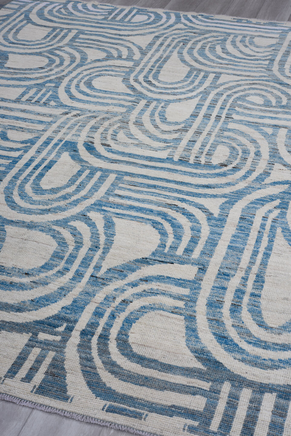 7' x 9' one-of-a-kind handmade vintage Tulu large size rug. Color palette: ivory, sky blue, slate, cream, light blue, gray