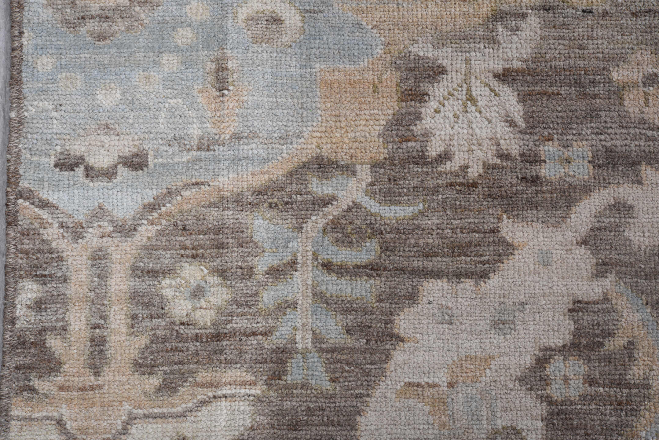 9' x 12' one-of-a-kind handmade vintage Oushak large size rug. Color palette: taupe, ivory, pale blue, brown, cream, gold