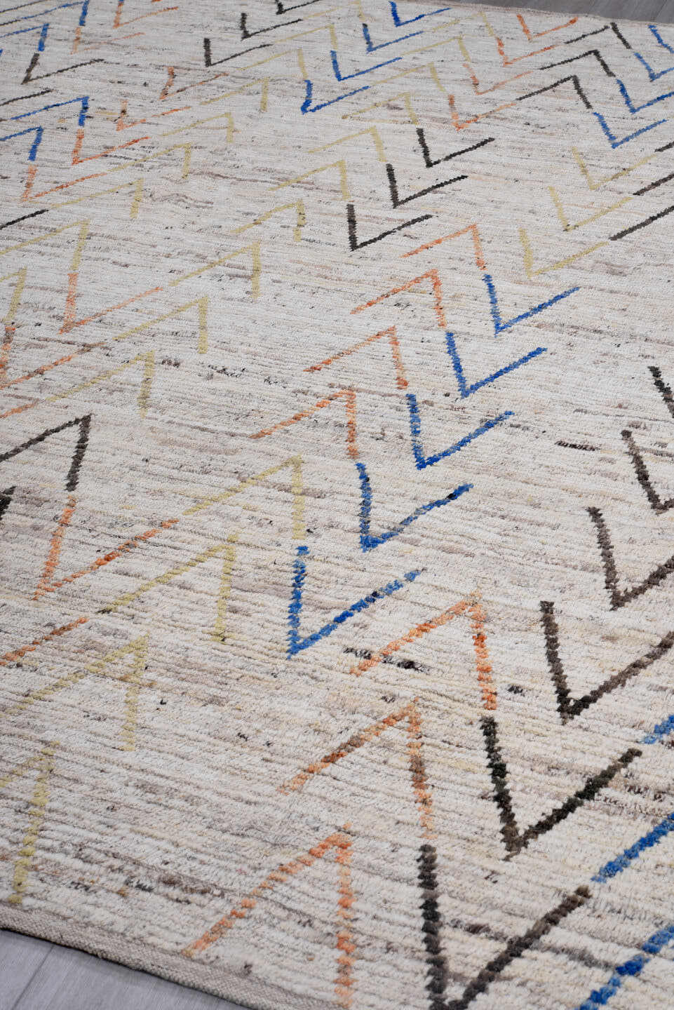 9' x 11' one-of-a-kind handmade vintage Tulu large size rug. Color palette: ivory, taupe, charcoal, cobalt, soft_gold, coral