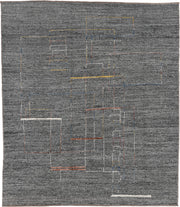 8' x 9' one-of-a-kind handmade vintage Tulu rug. Color palette: charcoal, ivory, taupe, rust, gold, slate, blue, gray, black