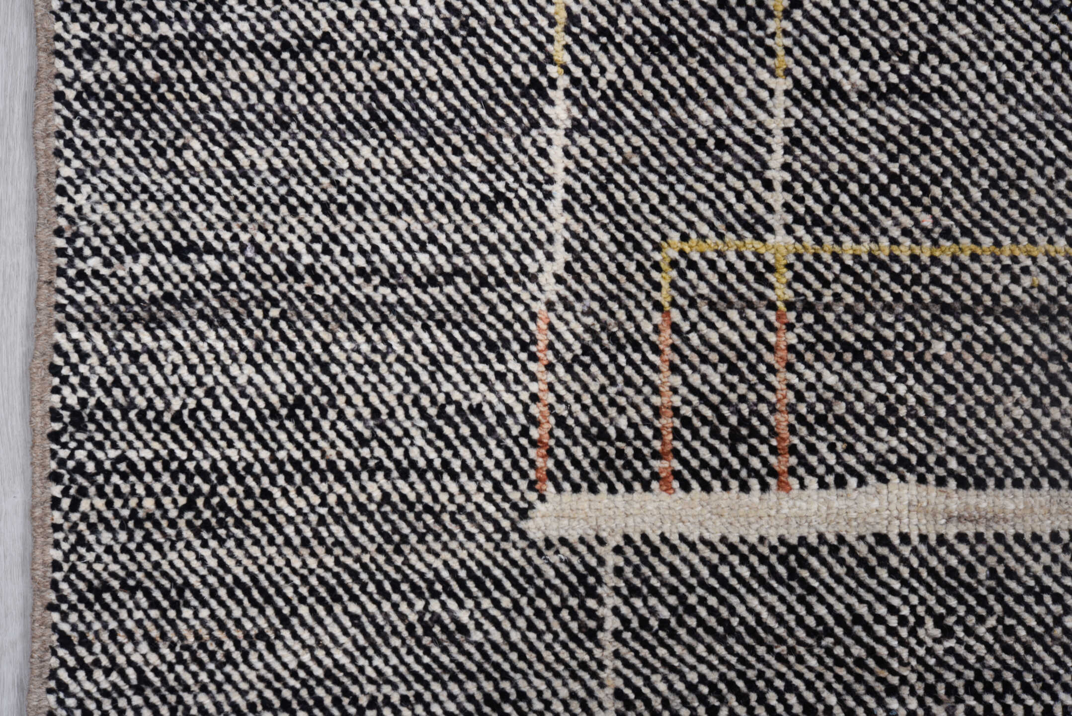 8' x 9' one-of-a-kind handmade vintage Tulu rug. Color palette: charcoal, ivory, taupe, rust, gold, slate, blue, gray, black