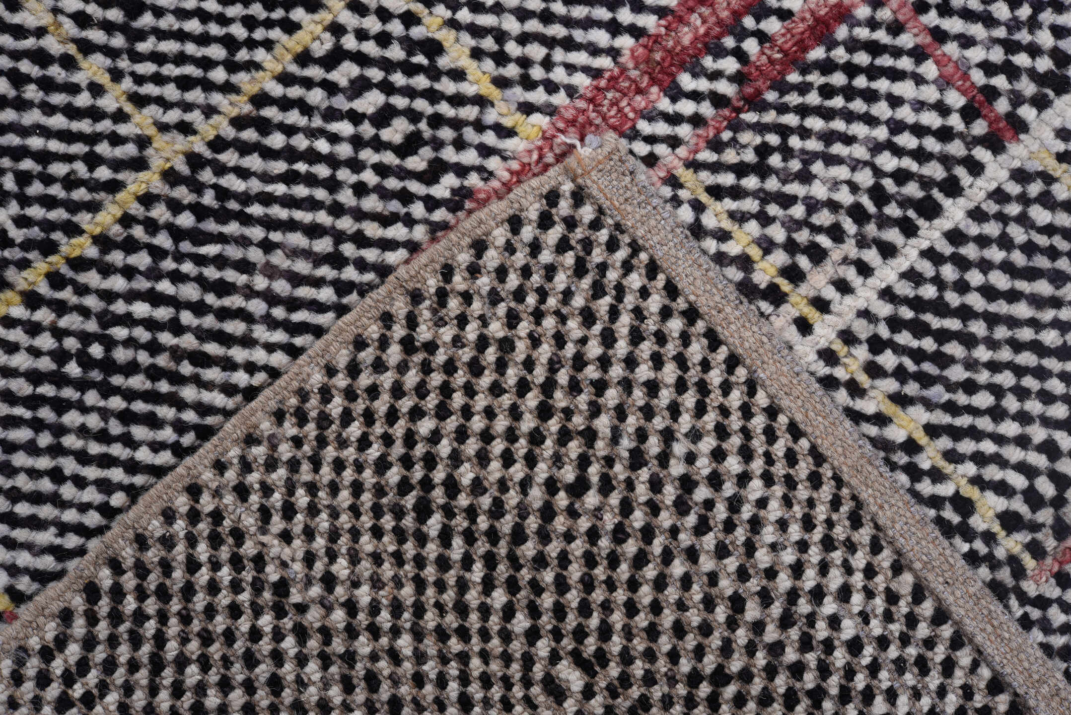 6' x 8' one-of-a-kind handmade vintage Tulu medium size rug. Color palette: charcoal, ivory, red, blue, gold, gray, black