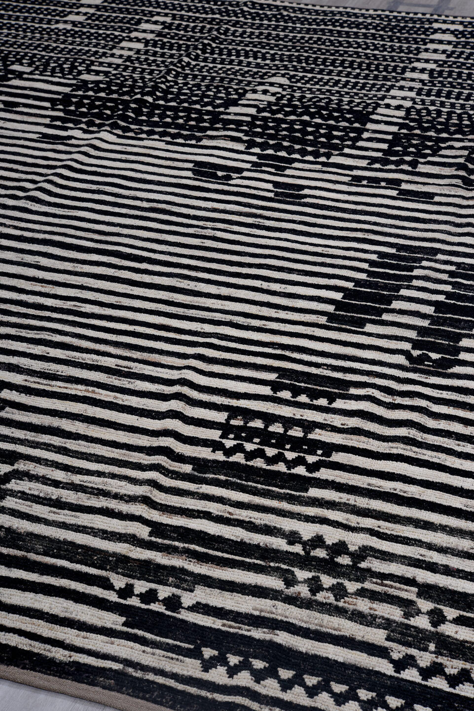 9' x 11' one-of-a-kind handmade vintage Tulu large size rug. Color palette: ivory, black, charcoal, gray