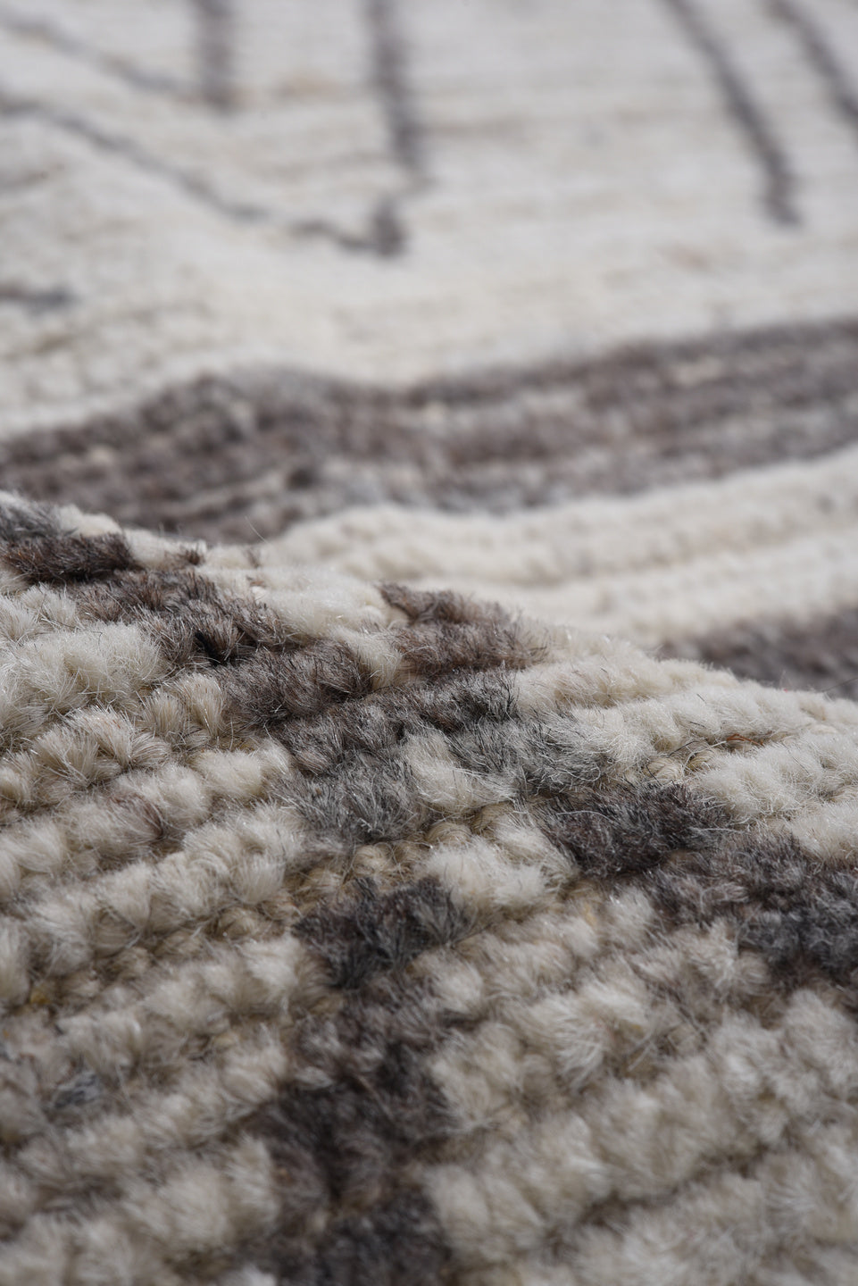 9' x 11' one-of-a-kind handmade vintage Tulu large size rug. Color palette: ivory, charcoal, taupe, gray, black, beige