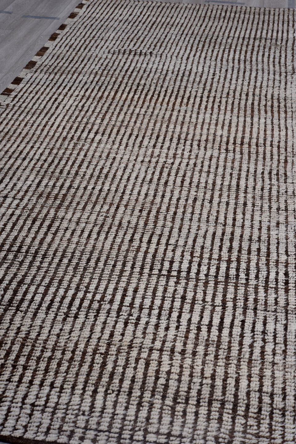 4' x 12' one-of-a-kind handmade vintage Tulu runner rug. Color palette: ivory, brown, espresso, black
