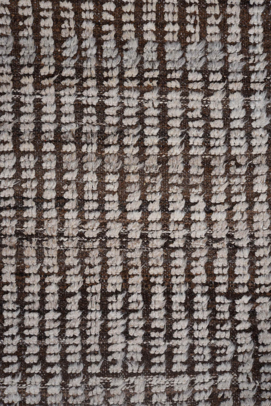 4' x 12' one-of-a-kind handmade vintage Tulu runner rug. Color palette: ivory, brown, espresso, black