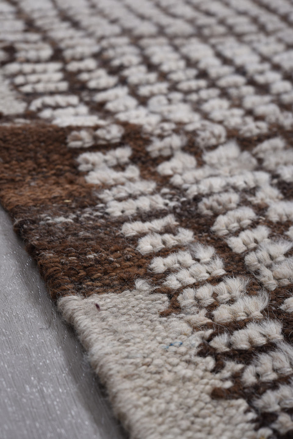 4' x 12' one-of-a-kind handmade vintage Tulu runner rug. Color palette: ivory, brown, espresso, black
