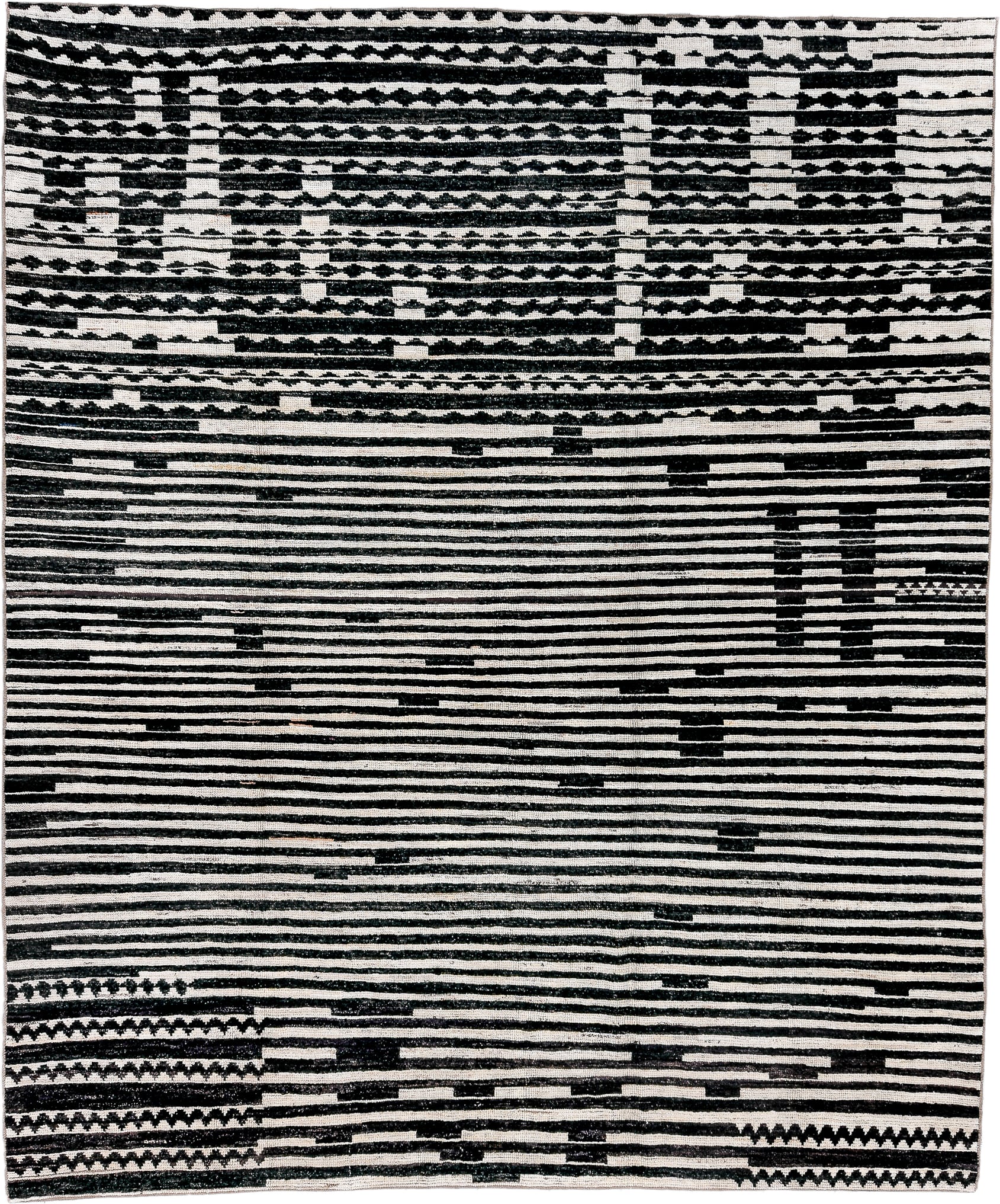 8' x 9' one-of-a-kind handmade vintage Tulu rug. Color palette: ivory, black, charcoal, gray