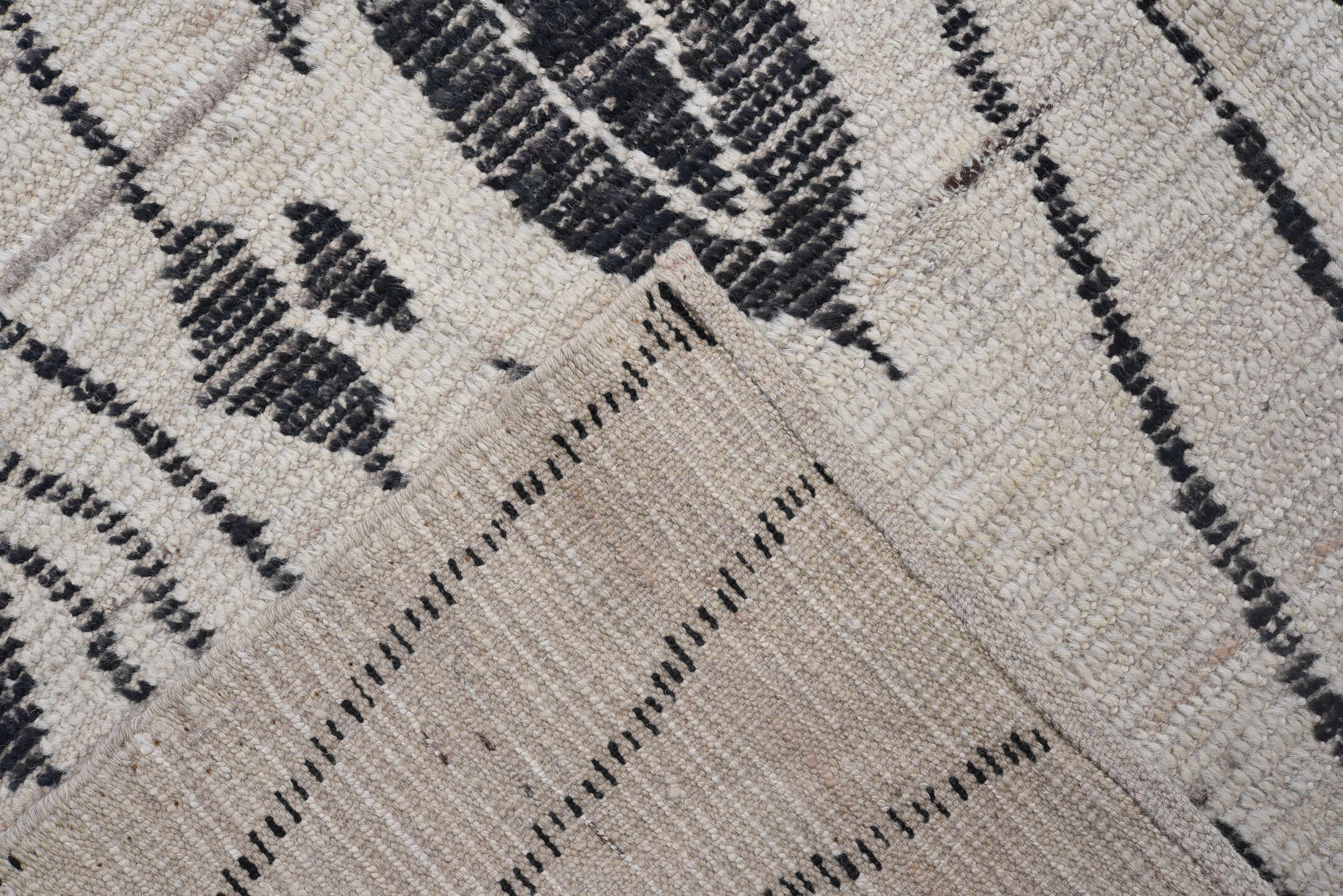 5' x 19' one-of-a-kind handmade vintage Tulu rug. Color palette: ivory, black, charcoal, gray