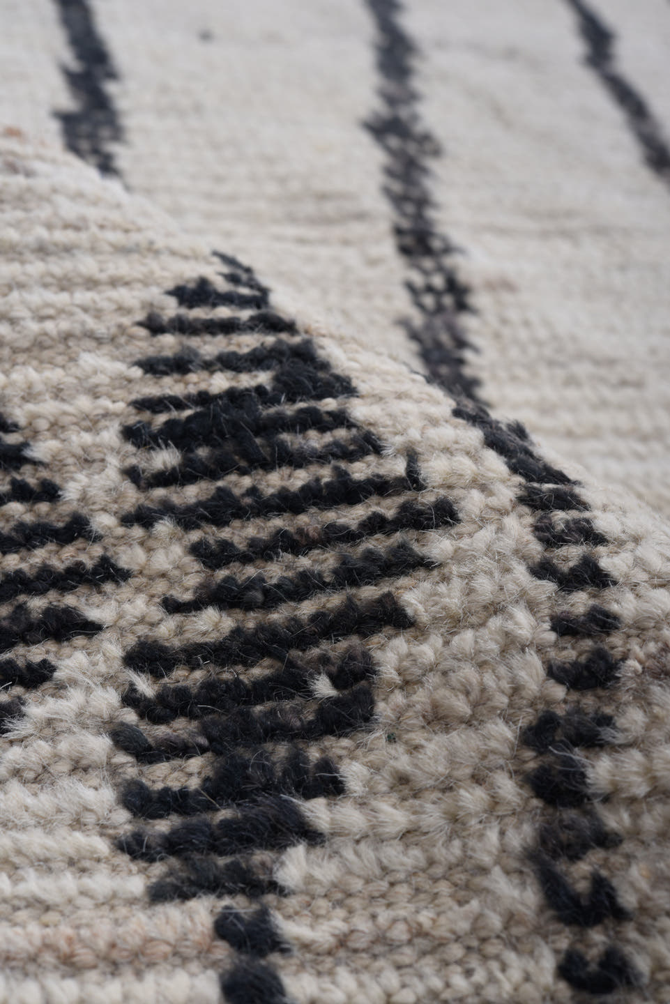 5' x 19' one-of-a-kind handmade vintage Tulu rug. Color palette: ivory, black, charcoal, gray