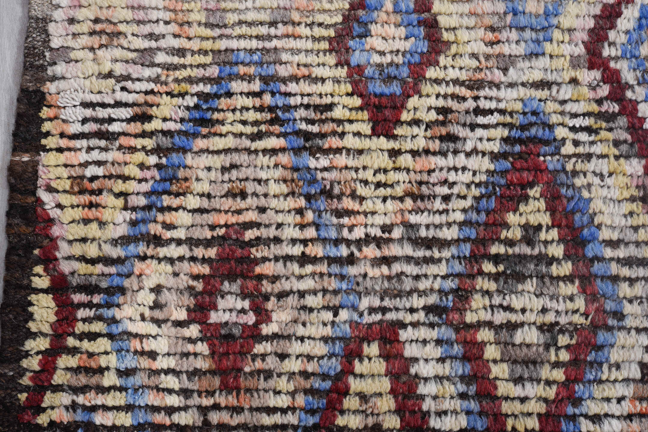 13' x 13' one-of-a-kind handmade vintage Tulu oversize rug. Color palette: ivory, red, blue, charcoal, taupe, gray, black