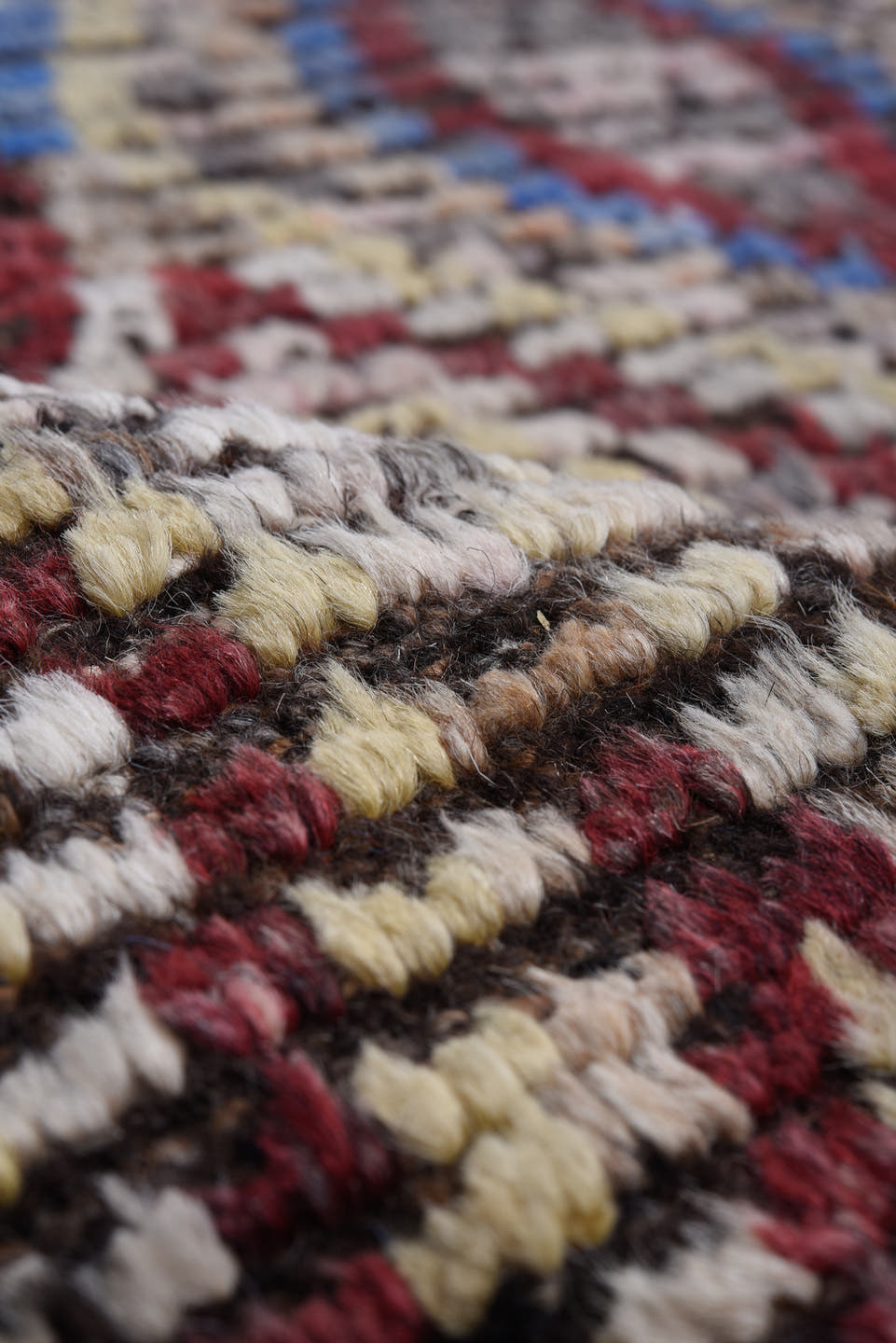 13' x 13' one-of-a-kind handmade vintage Tulu oversize rug. Color palette: ivory, red, blue, charcoal, taupe, gray, black