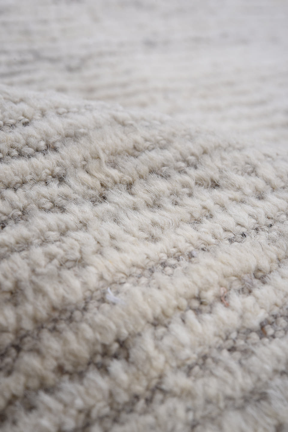 8' x 9' one-of-a-kind handmade vintage Tulu rug. Color palette: ivory, cream, taupe, light gray, beige, charcoal, gray