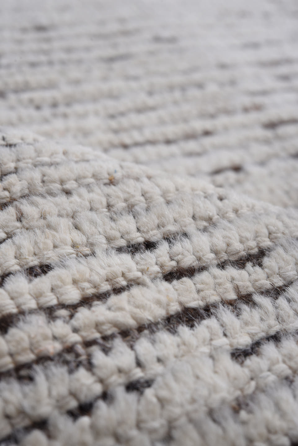 9' x 11' one-of-a-kind handmade vintage Tulu large size rug. Color palette: ivory, charcoal, taupe, brown, gray, black