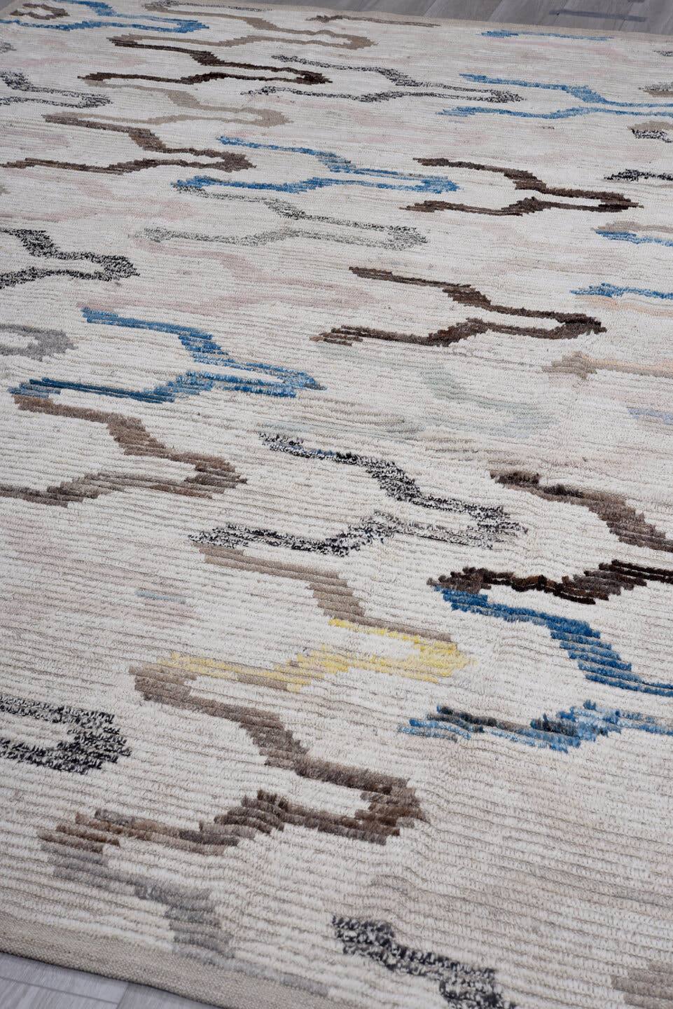 8' x 11' one-of-a-kind handmade vintage Tulu large size rug. Color palette: ivory, taupe, sky blue, gray, brown, charcoal