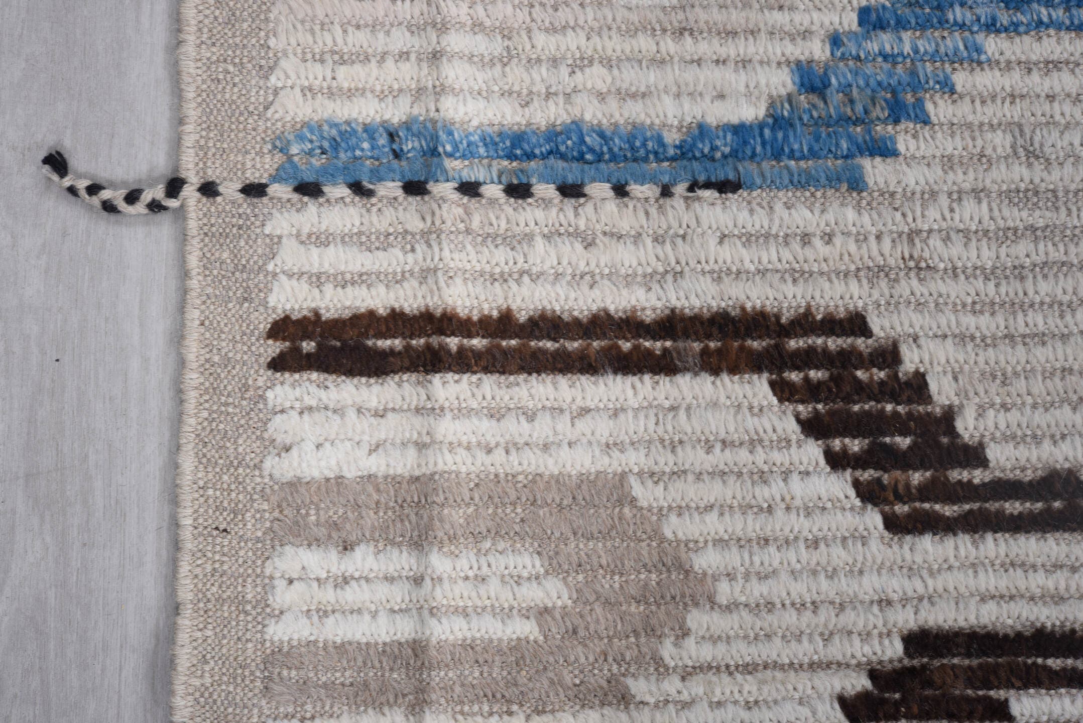 8' x 11' one-of-a-kind handmade vintage Tulu large size rug. Color palette: ivory, taupe, sky blue, gray, brown, charcoal