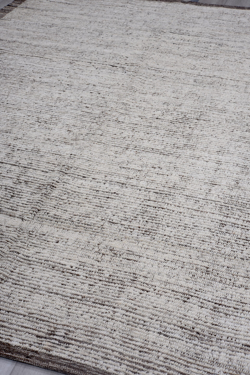 6' x 8' one-of-a-kind handmade vintage Tulu rug. Color palette: ivory, brown, taupe, charcoal, beige, gray, black