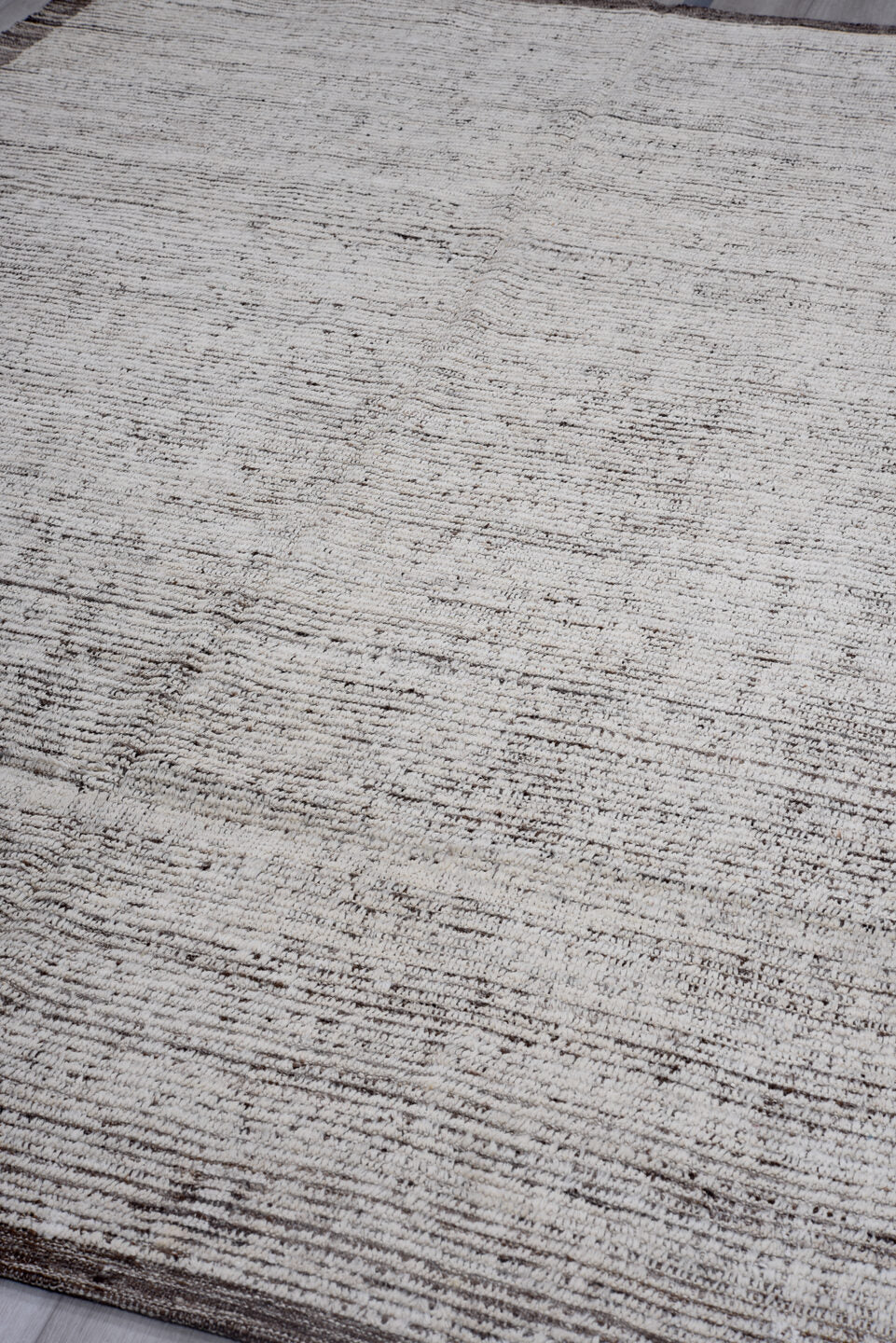 6' x 8' one-of-a-kind handmade vintage Tulu rug. Color palette: ivory, brown, taupe, charcoal, beige, gray, black