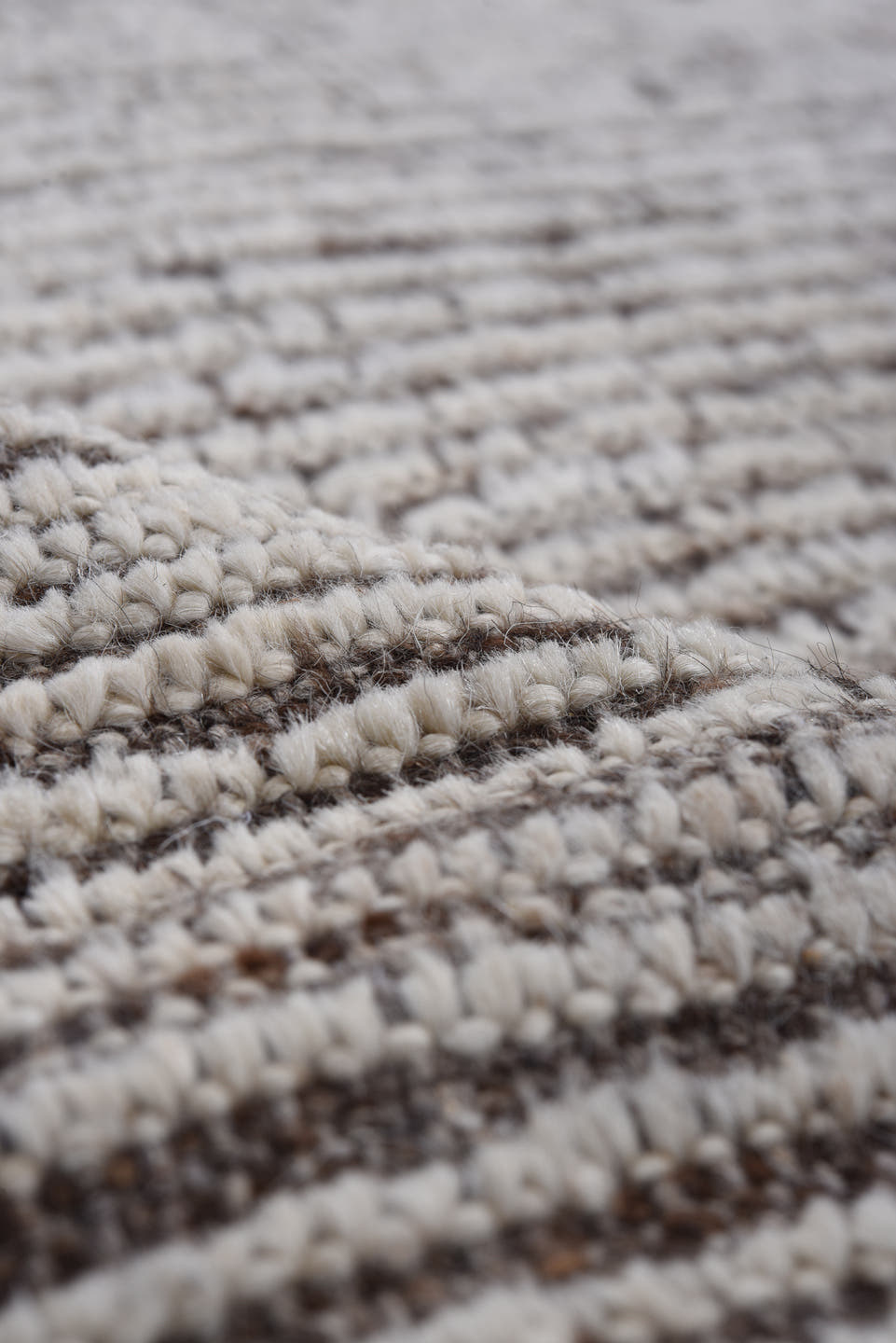 6' x 8' one-of-a-kind handmade vintage Tulu rug. Color palette: ivory, brown, taupe, charcoal, beige, gray, black
