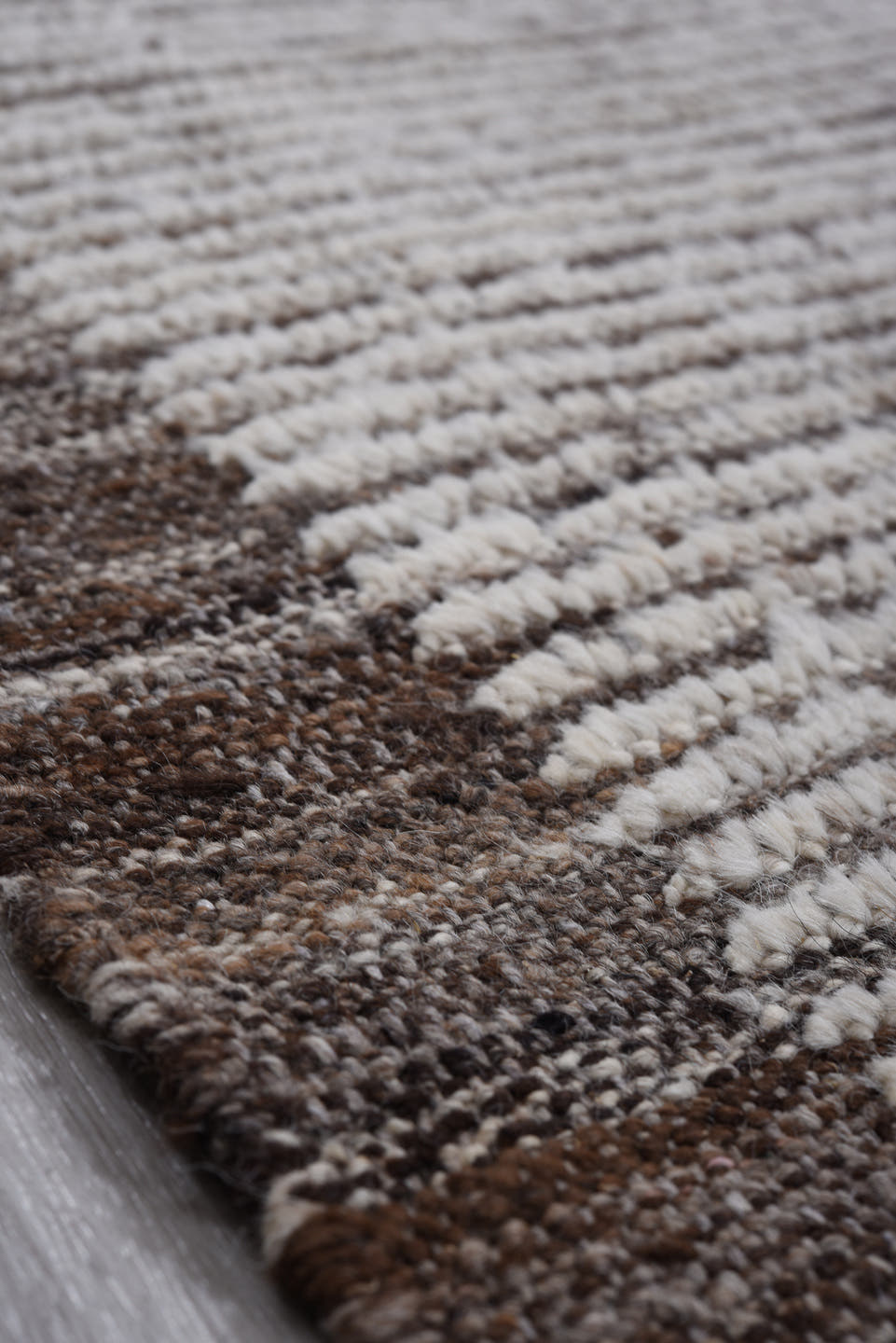 6' x 8' one-of-a-kind handmade vintage Tulu rug. Color palette: ivory, brown, taupe, charcoal, beige, gray, black