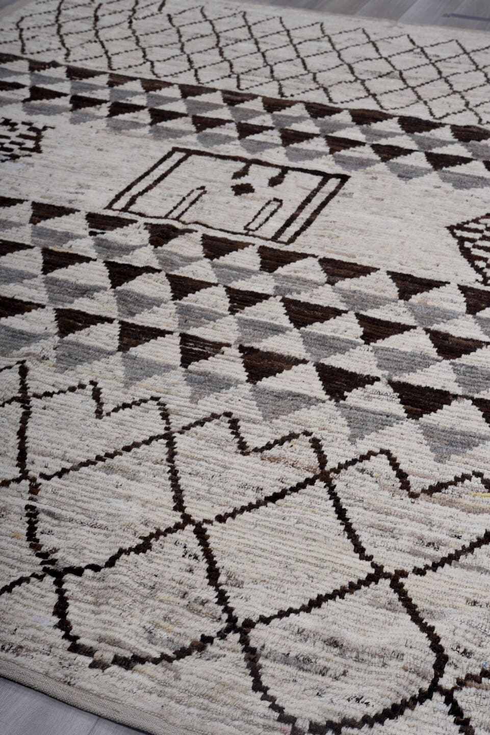 9' x 12' one-of-a-kind handmade vintage Tulu large size rug. Color palette: ivory, gray, brown, charcoal, taupe, black