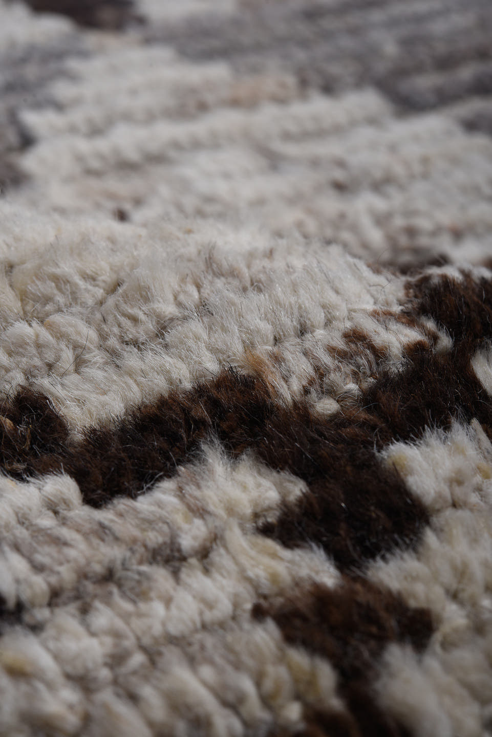 9' x 12' one-of-a-kind handmade vintage Tulu large size rug. Color palette: ivory, gray, brown, charcoal, taupe, black