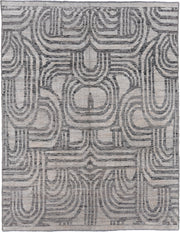 7' x 9' one-of-a-kind handmade vintage Tulu rug. Color palette: ivory, gray, charcoal, taupe, black, beige