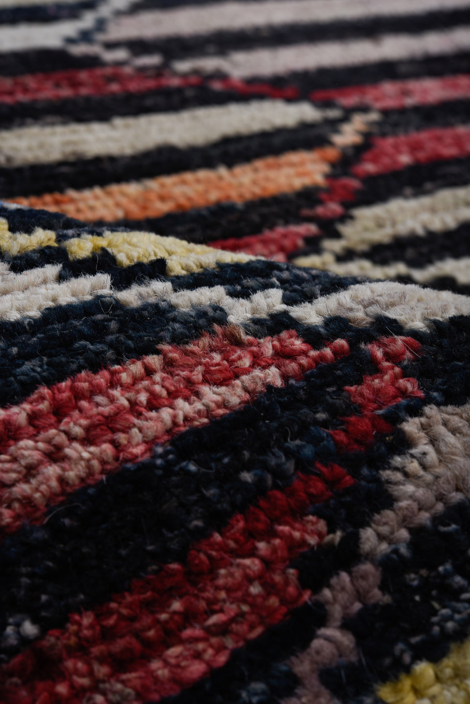 9' x 11' one-of-a-kind handmade vintage Tulu large size rug. Color palette: ivory, charcoal, indigo, crimson, rust, slate