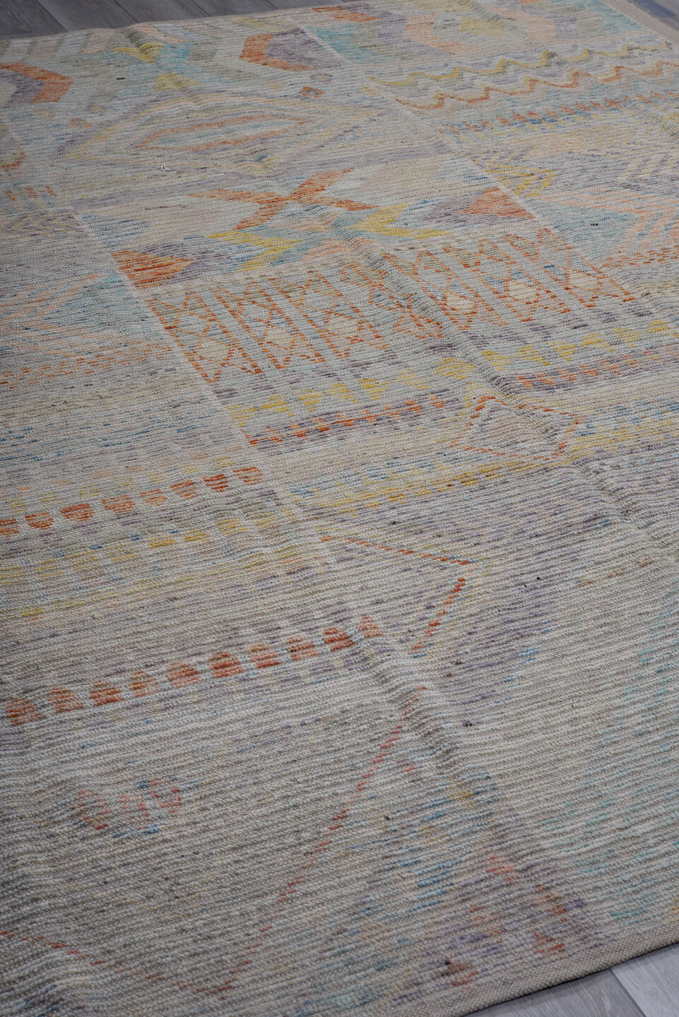 8' x 9' one-of-a-kind handmade vintage Tulu large size rug. Color palette: gray, ivory, sky_blue, peach, pale_yellow, taupe